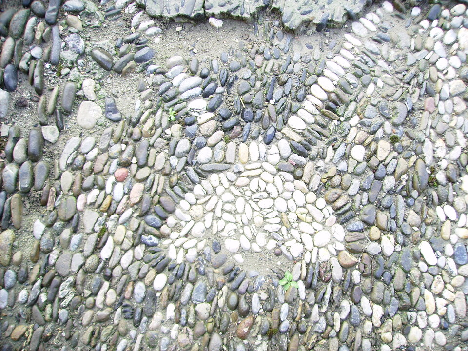 Historic cobblestone street inside the fortified city of Carcassonne, France