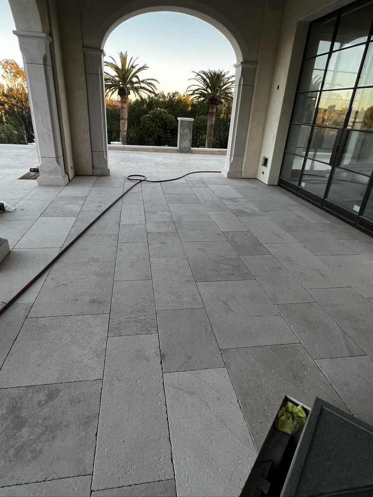 Installed French limestone flooring and paving