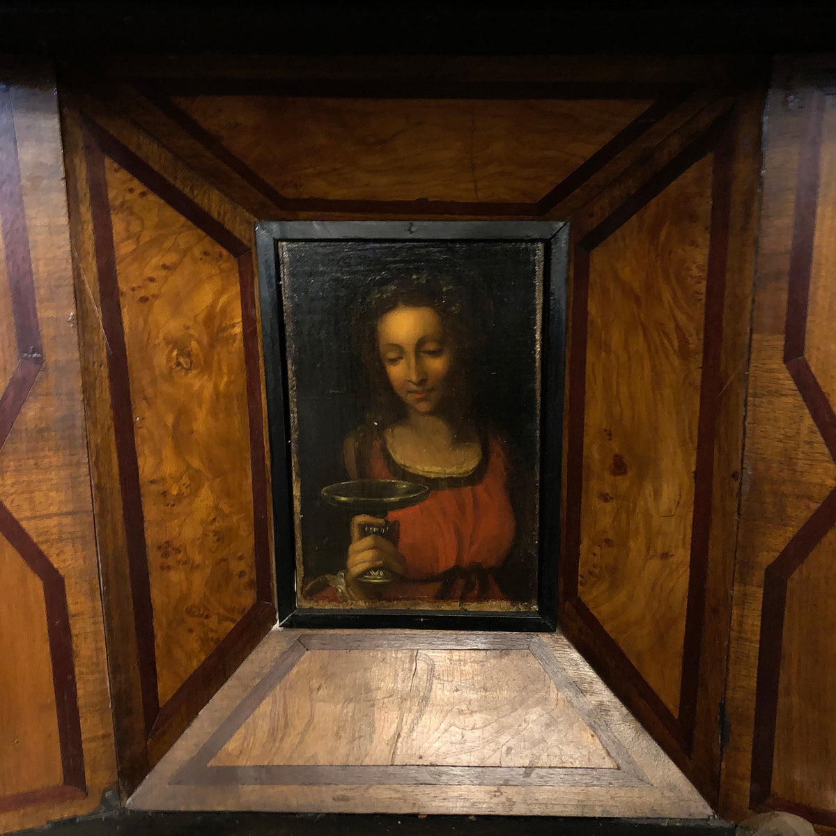 Cabinet for displaying religious artifacts