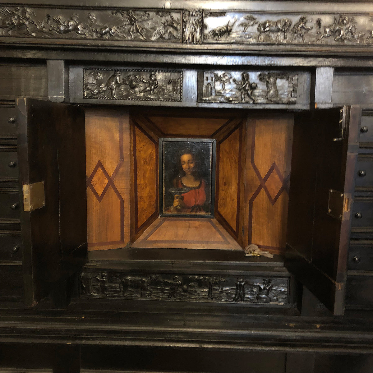 Cabinet for displaying religious artifacts